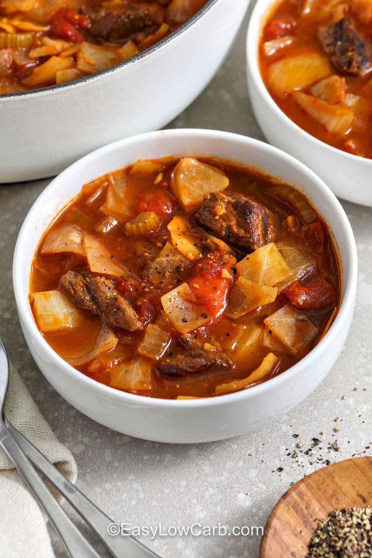 Make beef and cabbage soup when you want a cozy dinner that stretches into leftovers. Chuck roast and vegetables simmer in beef broth with diced tomatoes and tomato paste for a rich base. Worcestershire adds savory depth, and cabbage turns tender and sweet in the broth. This keto beef soup style meal is hearty without being heavy, and it’s perfect for make-ahead cooking and meal prep. #easylowcarb bowls of Beef and Cabbage Soup