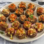 plate of sausage Keto Stuffed Mushrooms