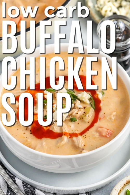 This buffalo chicken soup delivers bold wing flavor in a cozy, creamy bowl. A blended cauliflower base thickens the broth without flour, while cream cheese adds a smooth, rich texture. Stir in shredded chicken and buffalo sauce at the end so the chicken stays tender and the heat tastes fresh. Top with blue cheese or cheddar and green onions for a classic finish that feels restaurant-worthy. #easylowcarb low carb Buffalo Chicken Soup with writing