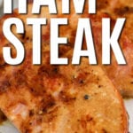 glazed Ham Steak on a plate with writing