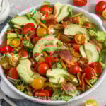 BLT salad in a white serving bowl
