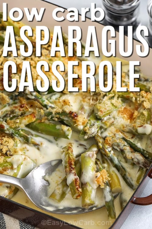 Bake a low carb asparagus casserole for a weeknight side that tastes like a steakhouse favorite. The asparagus stays tender-crisp thanks to a quick blanch, then gets coated in a creamy cheese sauce made with heavy cream, cream cheese, cheddar or gruyere, and parmesan. A crunchy pork rind topping browns beautifully in the oven. Serve with pork chops or roasted chicken for an easy keto dinner. #easylowcarb low carb Asparagus Casserole with writing
