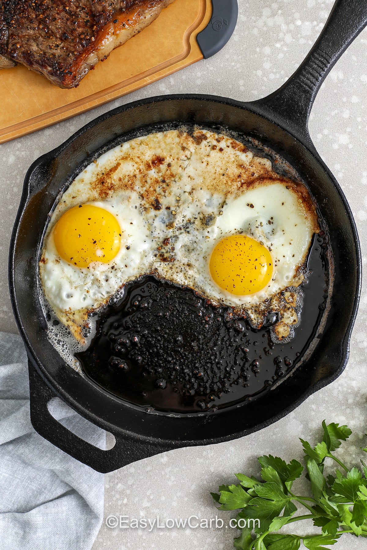 Make this easy steak and eggs breakfast when you want a low carb dish that feels rich, savory, and a little special. The steak is seasoned simply, seared in a hot skillet, and finished with butter before the eggs are cooked right in the pan. It is a practical high protein breakfast with steakhouse flavor, and it is easy to customize with spinach, avocado, or your favorite fried egg style. #easylowcarb cooking eggs in butter and steak grease to make Steak and Eggs Breakfast