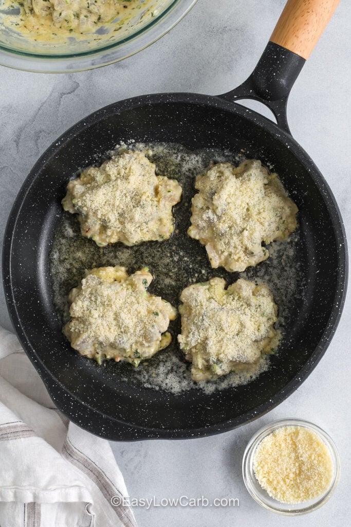 Shrimp Cakes cooking on a pan