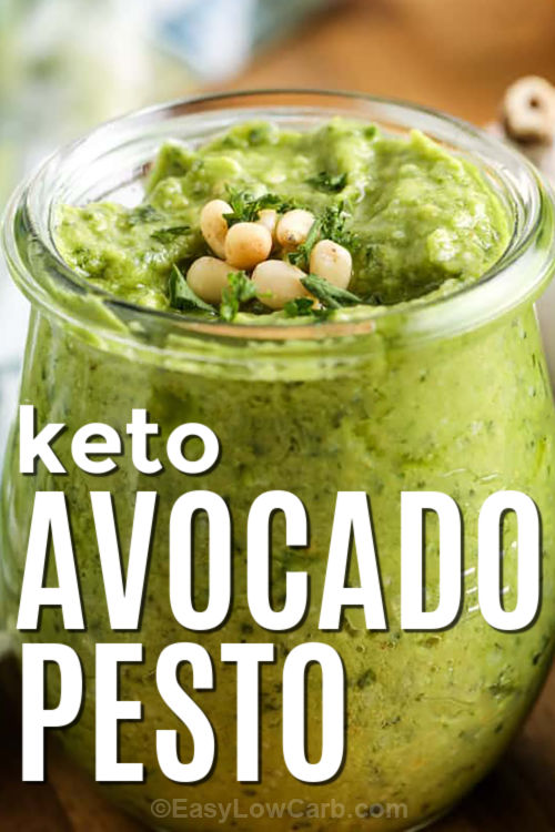This keto avocado pesto sauce is a bright and creamy way to add flavor to low carb meals. Fresh basil, avocado, garlic, lemon juice, parmesan, pine nuts, and olive oil create a smooth sauce that works with warm or chilled dishes. Try it with zoodles, grilled chicken, salmon, roasted vegetables, or as a flavorful spread for low carb wraps. #easylowcarb jar of Avocado Pesto with writing