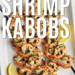 low carb Grilled Shrimp Kabobs on a plate with writing