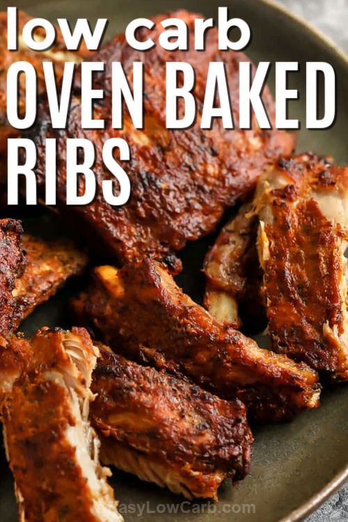 You will love this juicy oven baked ribs recipe with smoky spices and sticky low carb barbecue sauce. The ribs bake up tender in the oven with simple pantry seasonings and plenty of bold flavor in every bite. This easy dinner is perfect for family meals, game days, or weekend cookouts when you want barbecue flavor without a smoker. Serve these fall-off-the-bone ribs with your favorite low carb sides tonight. Try this easy recipe for dinner soon. #easylowcarb low carb Oven Baked Ribs with writing