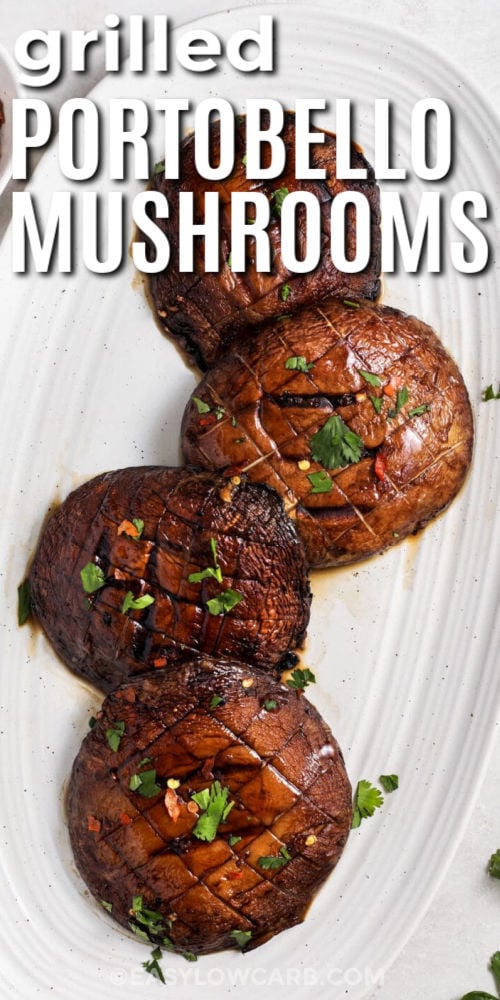 Grilled portobello mushrooms turn simple ingredients into a flavorful side dish that fits any summer meal. The savory soy marinade blends with fresh garlic, ginger, and sesame for bold flavor in every bite. Once grilled, the mushrooms become tender with smoky edges that make them perfect for burgers, grain bowls, or easy vegetarian dinners. This recipe is simple to prep and always a hit at backyard cookouts or family dinners. Save this recipe for your next barbecue. #easylowcarb grilled Grilled Portobello Mushrooms on a plate