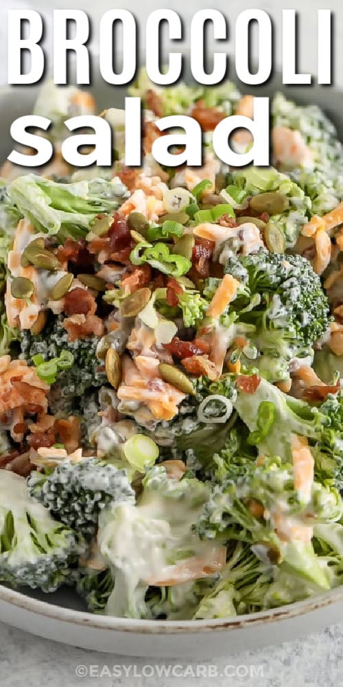 This keto broccoli salad is a creamy, crunchy low-carb salad that's perfect as a side or main dish. Made with just 5 ingredients, it’s a breeze to prepare. Packed with broccoli, cheese, nuts, bacon bits, and green onions, all mixed in a creamy mustard dressing, it's fresh and flavorful. Add cauliflower for extra color or toasted seeds for more crunch. Save this crispy favorite for your next dinner or cookout. #easylowcarb bowl of Keto Broccoli Salad with a title
