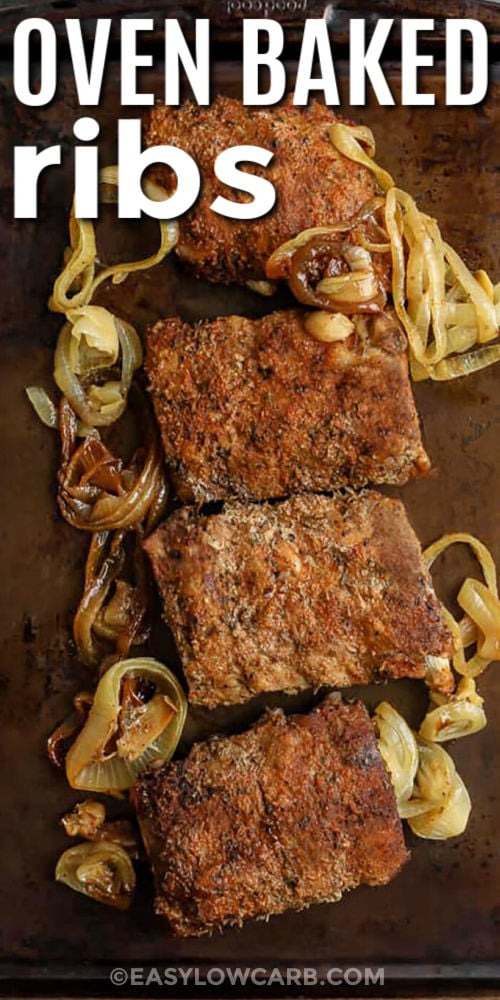 This oven baked ribs recipe makes tender baked ribs in the oven with a smoky dry rub and caramelized barbecue glaze. Baby back ribs cook low and slow with onion and garlic for juicy flavor that tastes like classic BBQ at home. A quick finish under the broiler gives the ribs sticky edges and rich barbecue flavor without extra sugar. These keto ribs are hearty, comforting, and easy enough for busy nights. Add this recipe to your dinner plans this week. #easylowcarb Oven Baked Ribs on a sheet pan with onions and a title