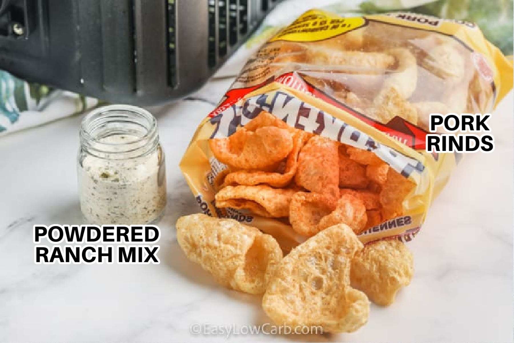 Pork rinds get even better with this easy air fryer recipe and a savory ranch seasoning. Every bite is light, crispy, and packed with bold flavor that makes this a favorite low carb snack. They are perfect for game day, movie night, or whenever you want something crunchy without reaching for chips. Keep this simple keto snack in your recipe collection and enjoy it again and again. Try it today. #easylowcarb pork rinds and ranch with labels to make Ranch Pork Rinds