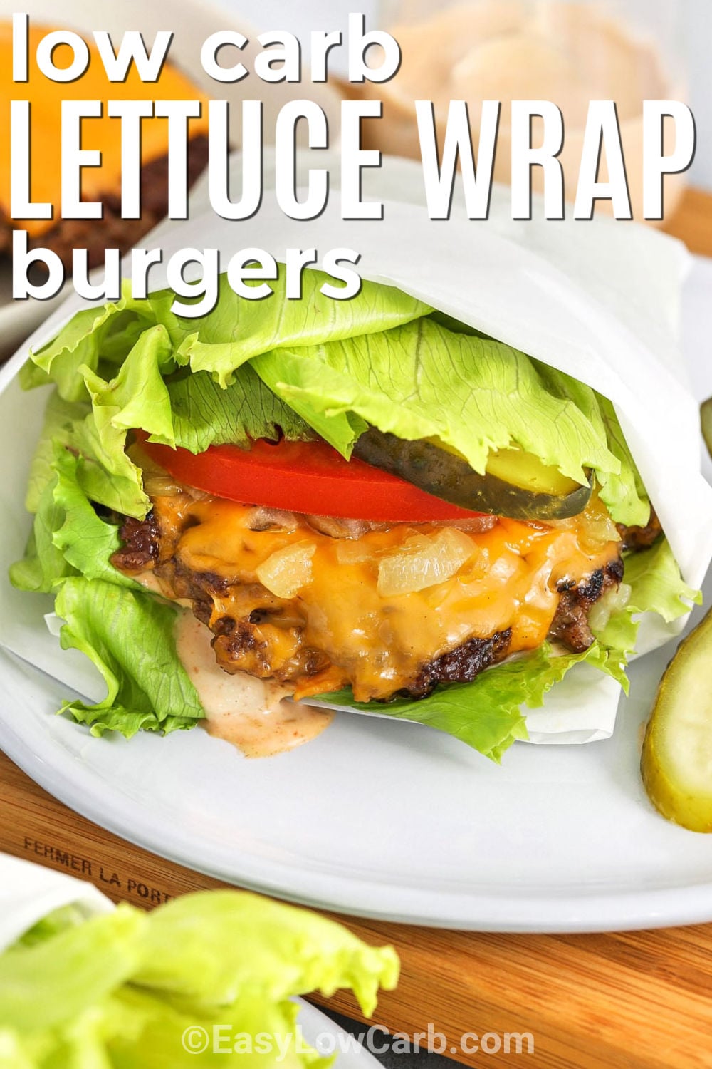 This lettuce wrap burger delivers the best contrast of hot, juicy beef and cold, crisp lettuce. A quick smash burger technique builds deep skillet flavor, while cheddar or American cheese melts over the patty. Add caramelized onions for sweetness or skip them when dinner needs to be faster. Finish with pickles, tomato, and low-carb burger sauce. Pin this satisfying recipe for an easy burger night at home. #easylowcarb Lettuce Wrap Burger with cheese and writing