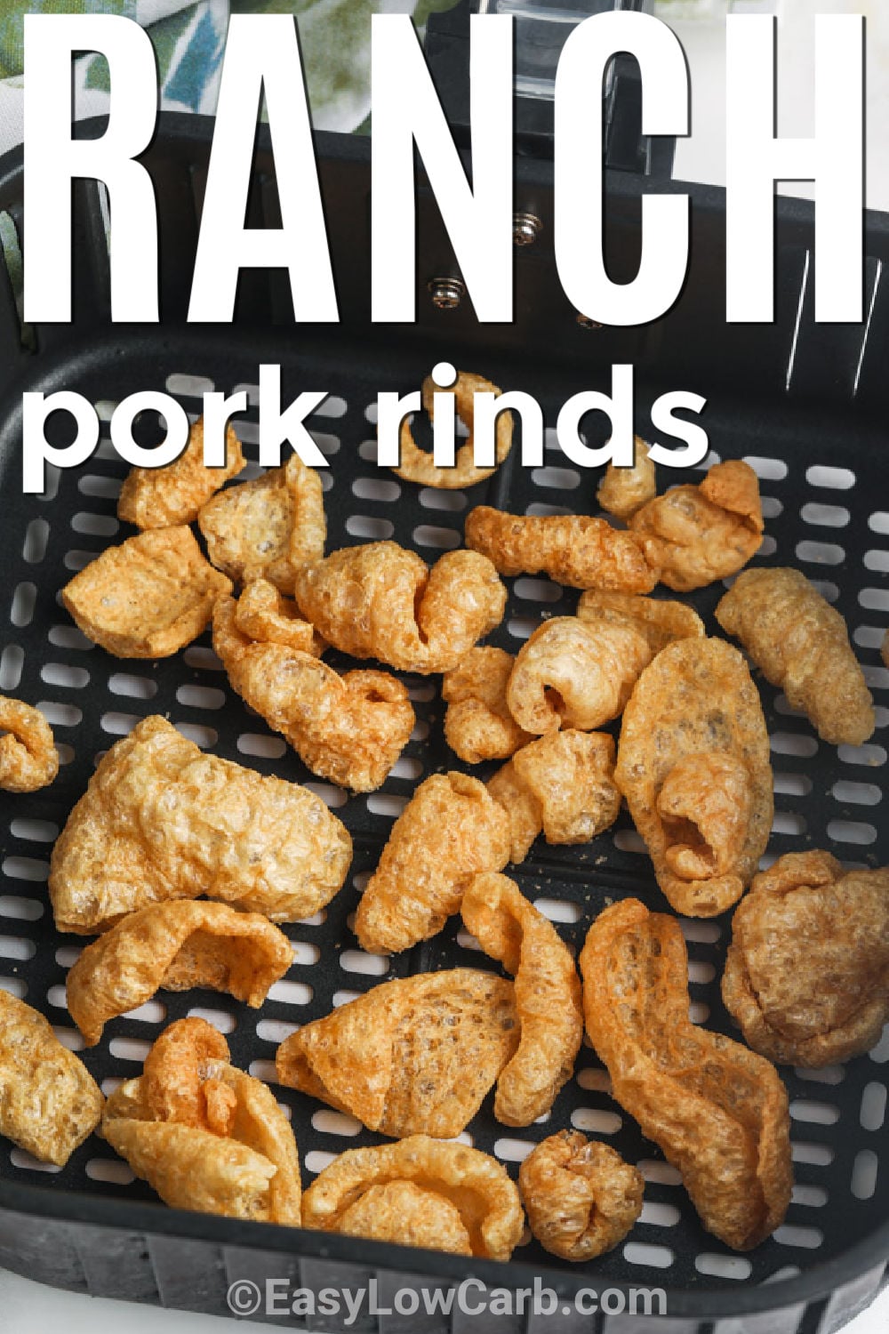 Pork rinds become extra crispy with this simple air fryer method and a tasty ranch seasoning blend. This easy low carb snack is full of crunchy texture and savory flavor in every bite. It is a great choice for sharing with family, serving at parties, or enjoying as a quick afternoon snack. Once you try this easy keto recipe, you will want to make it often. Give it a try today. #easylowcarb Ranch Pork Rinds in the air fryer with a title