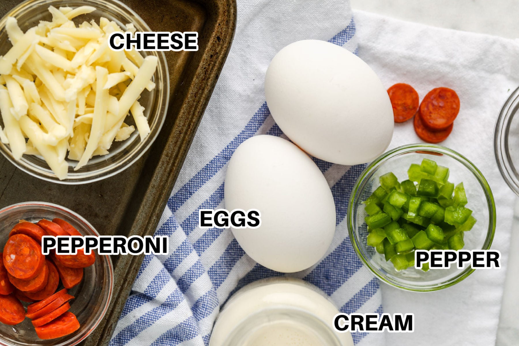 This easy keto breakfast pizza turns eggs into a tender, savory crust topped with pepperoni, mozzarella, oregano, and your choice of green pepper or mushrooms. It cooks in a small skillet and finishes under the broiler for hot, bubbly cheese without any dough to prepare. Serve it with low-carb tomato sauce for dipping when you want classic pizza flavor in a quick morning meal. Save this recipe for your next savory breakfast. #easylowcarb cream , pepper , eggs , pepperoni , cheese with labels to make Keto Breakfast Pizza