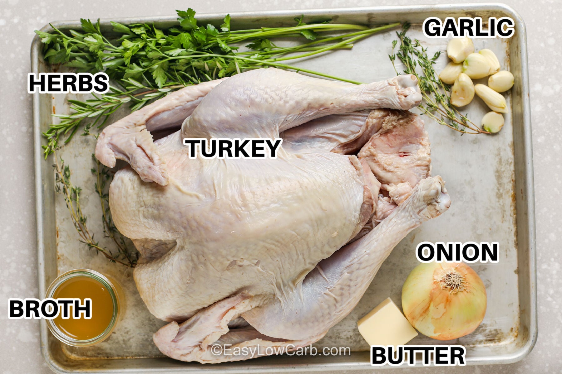 This oven roasted turkey brings classic holiday flavor to the table with juicy meat, golden skin, and a simple blend of fresh poultry herbs, onion, celery, and garlic. Brushing the whole turkey with butter or oil encourages beautiful browning while broth adds savory flavor to the roasting pan. It is a naturally low carb centerpiece with easy prep and plenty of servings for a crowd. Save this recipe for your next holiday dinner. #easylowcarb herbs , turkey , garlic , onion , butter , broth with labels to make Oven Roasted Turkey