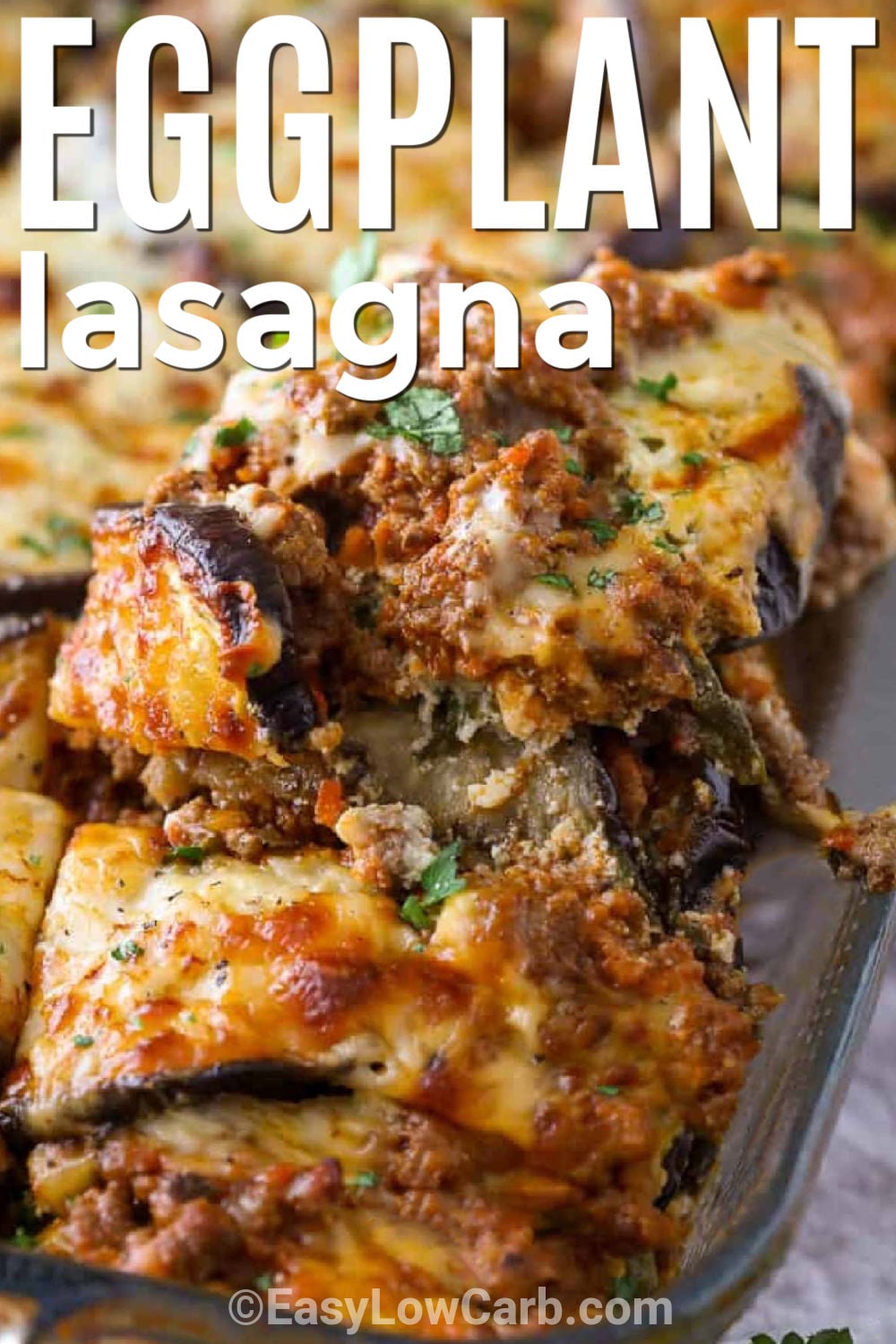 Make this eggplant lasagna recipe when you want a comforting low-carb meal that everyone can enjoy. Tender roasted eggplant takes the place of pasta, while layers of beef, tomato sauce, creamy ricotta, spinach, and mozzarella create a satisfying casserole. A generous layer of cheese on top makes this dinner extra inviting. Serve it with a simple salad for an easy family meal. Try this delicious recipe tonight. #easylowcarb close up of Eggplant Lasagna with a title.