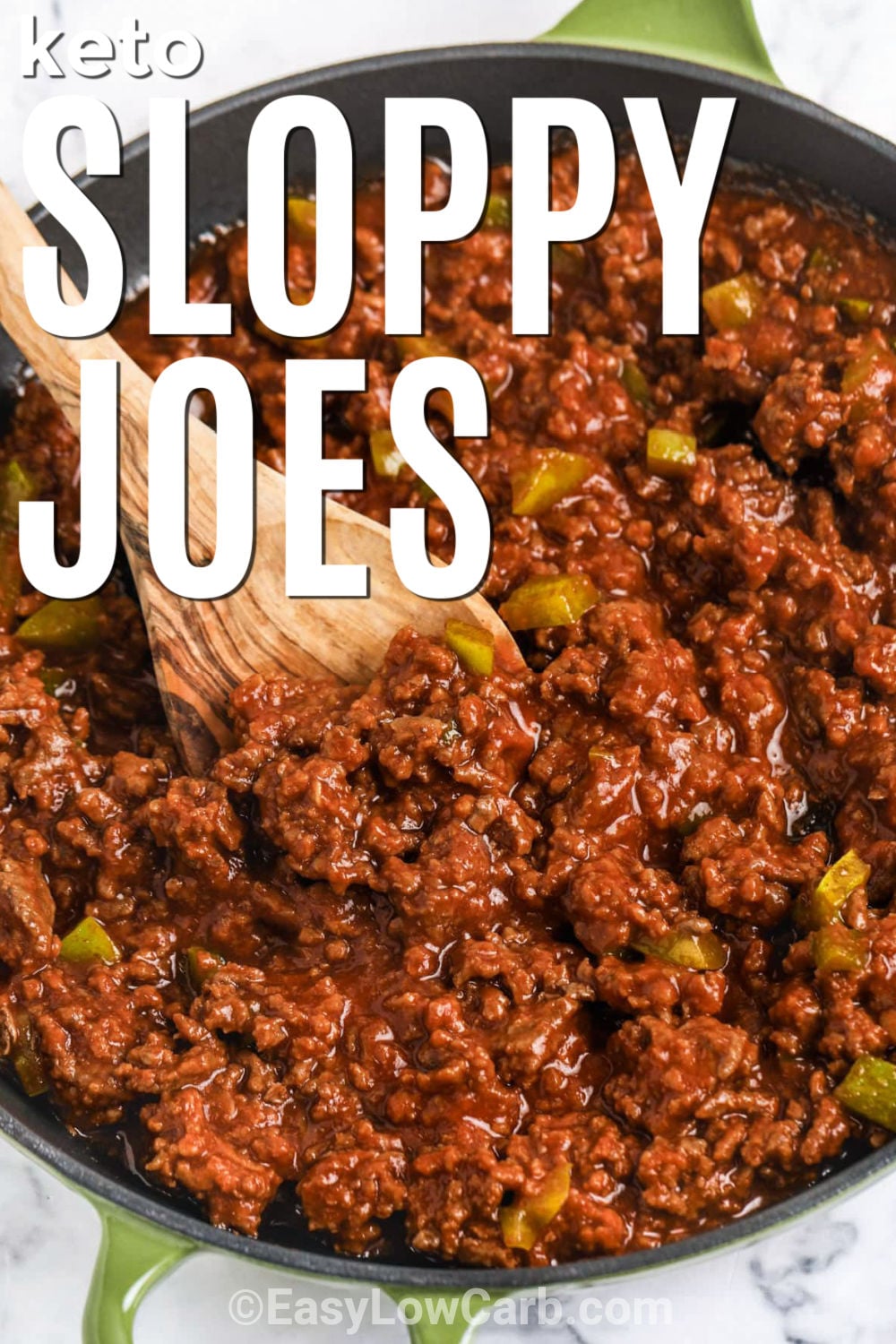 Keto sloppy Joes bring classic comfort-food flavor to the table with tender ground beef, green bell pepper, and a sweet and tangy sauce made with sugar-free ketchup. Everything cooks in one skillet and is ready in about 30 minutes, making this an easy choice for busy weeknights. Pile the saucy filling onto toasted keto hamburger buns or serve it over mashed cauliflower for a bunless option. Save this recipe for an easy low carb dinner. #easylowcarb pan of Keto Sloppy Joes with a wooden spoon and writing.