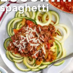 top view of Zucchini Spaghetti on a plate with a title.