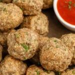 ground turkey meatballs on a plate.